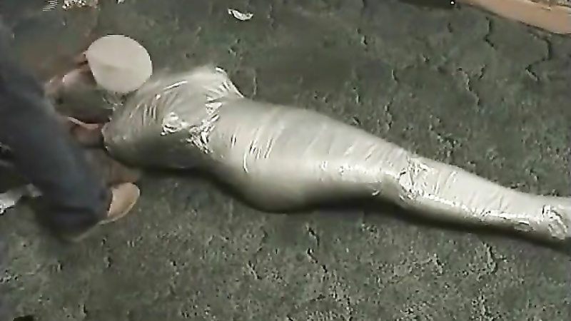 Breathless Angel - She is mummified in stretch film, and duct tape