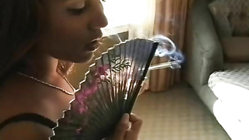 Sexy Smoker And Her Paper Fan