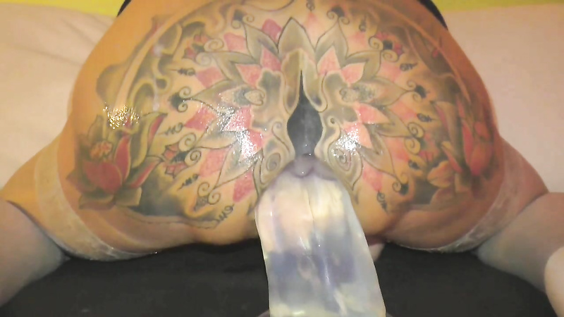 Gigantic anal dildo insertion