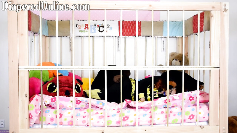 Red: Playing in Crib