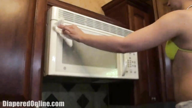 Adriana: Cleaning Microwave in Messy Diaper