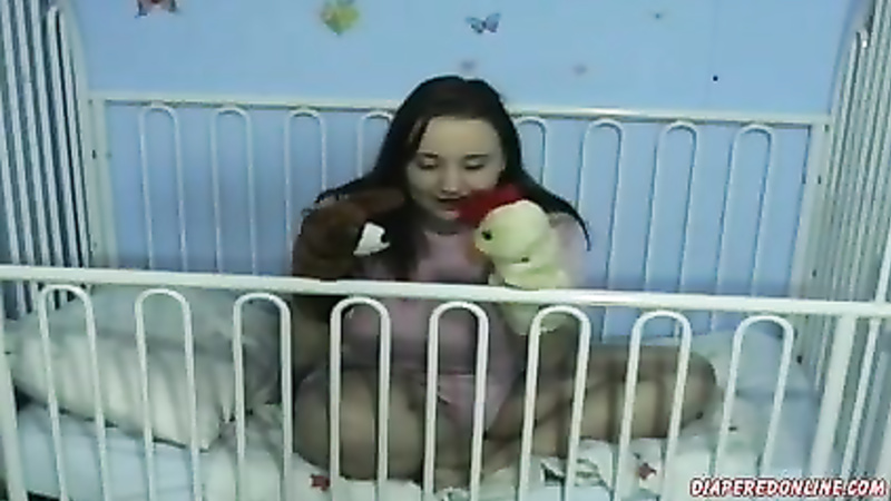 TaylorM: Puppets in Crib
