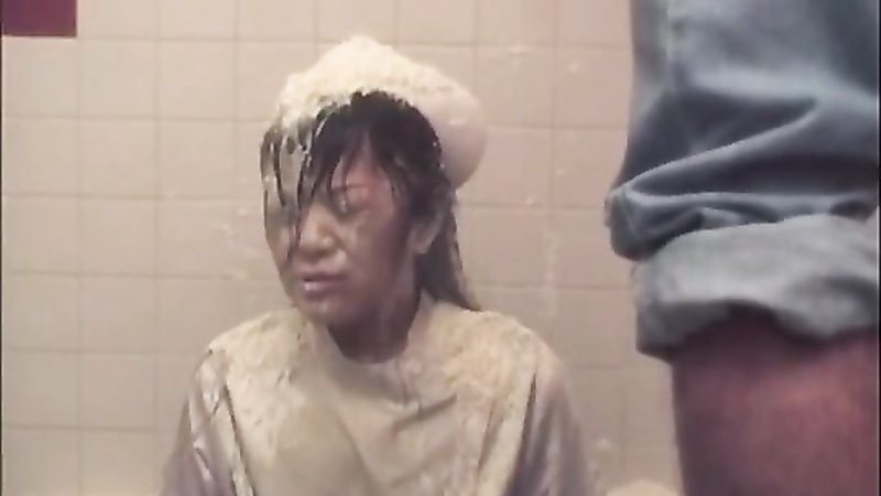 Asian girl gets a piss bukkake