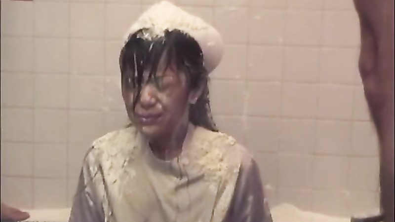 Asian girl gets a piss bukkake